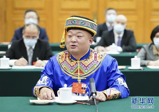  5月24日，全國人大代表宋慶禮參加湖北代表團的審議并發(fā)言。新華社記者 黃敬文 攝